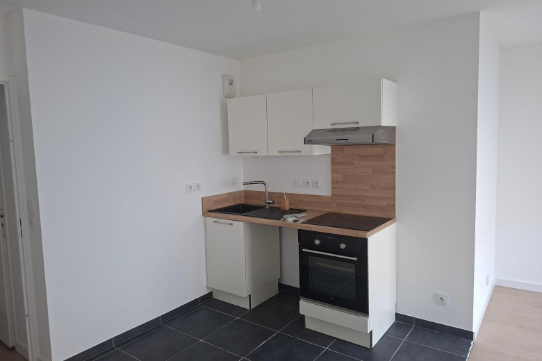 Appartement T2 en location à SAINT-JACQUES DE LA LANDE (GES04310060-610) - Photo 2